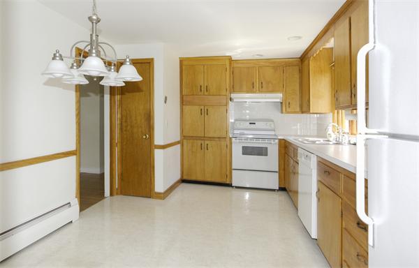 10 Phinney Road Lexington, MA 02421 - Photo 9 of 30 a kitchen with stainless steel appliances granite countertop a refrigerator a oven and a stove