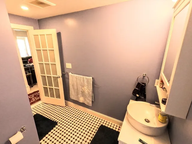 a bathroom with a sink and a toilet