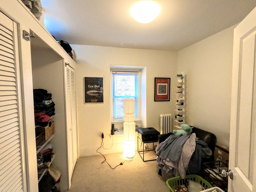 41 School Street, Unit 2 Boston, MA 02119 - Photo 19 of 36 a bedroom with furniture and a window