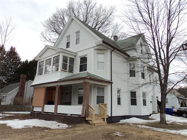 3 Isabel Street Springfield, MA 01109 - Photo 1 of 1 a front view of a house with a yard
