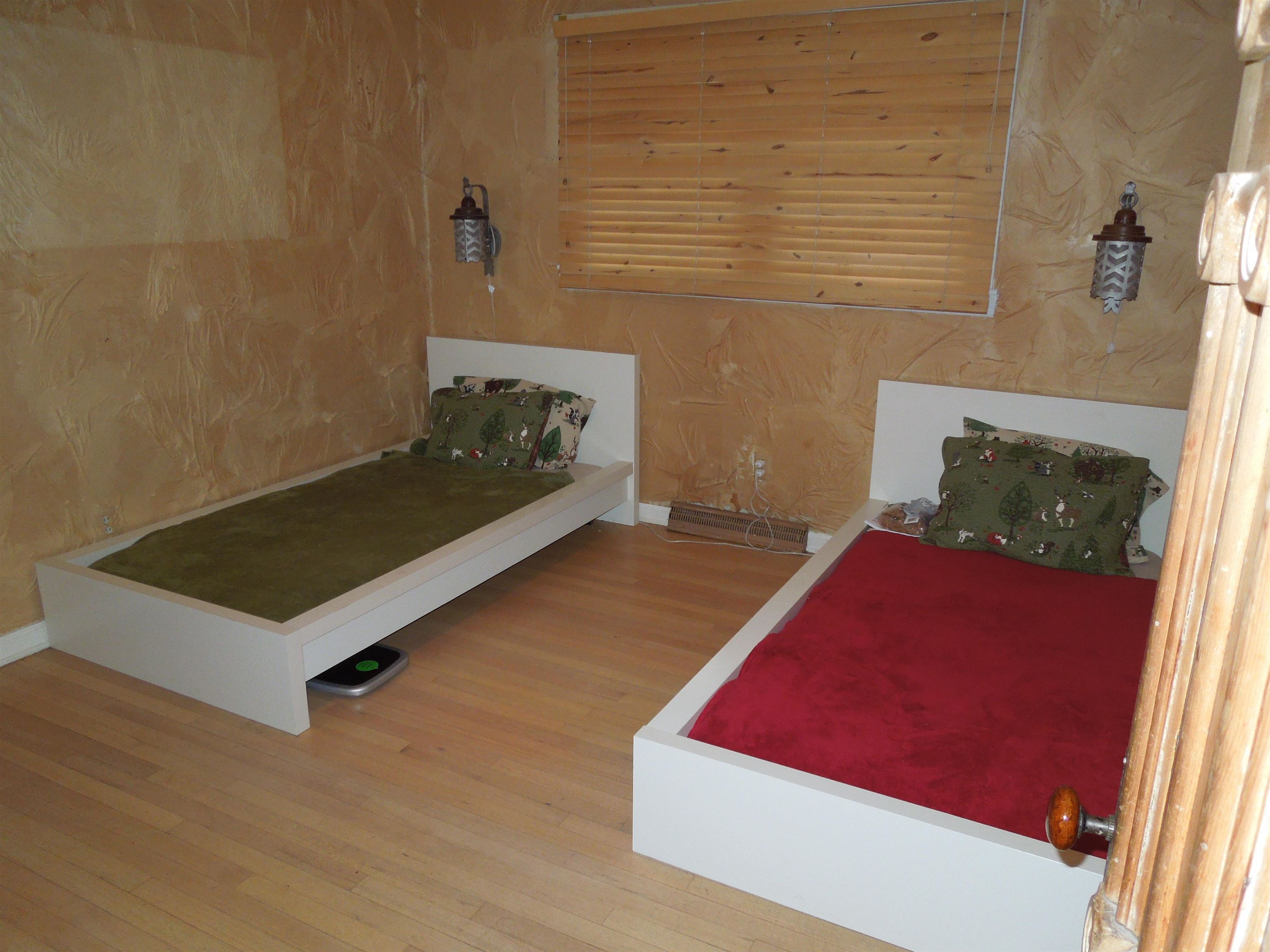 4721 Brookview Road Rockford, IL 61107 - Photo 11 of 26 a view of a room with a bed and a couch