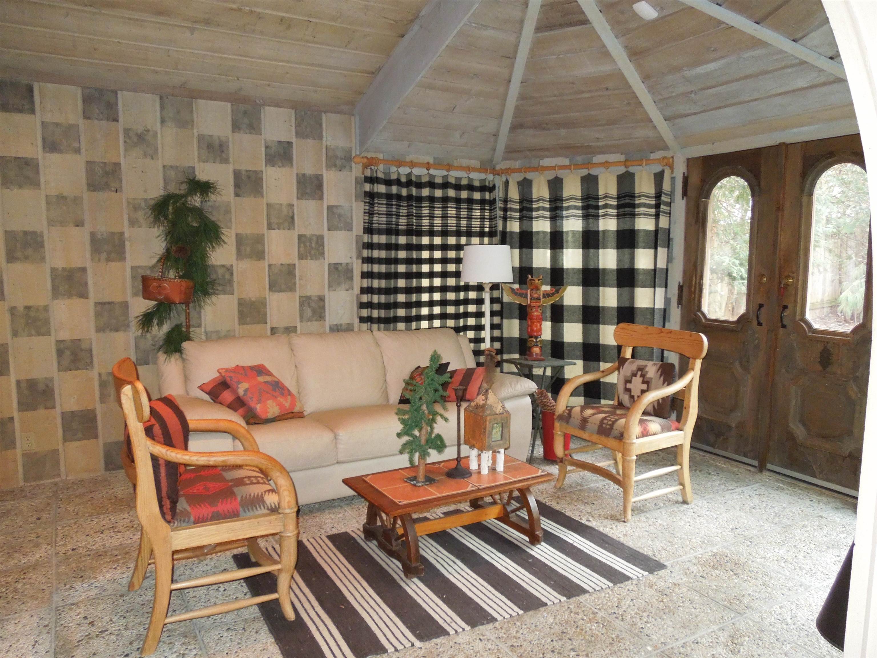 4721 Brookview Road Rockford, IL 61107 - Photo 17 of 26 a balcony with a table and chairs
