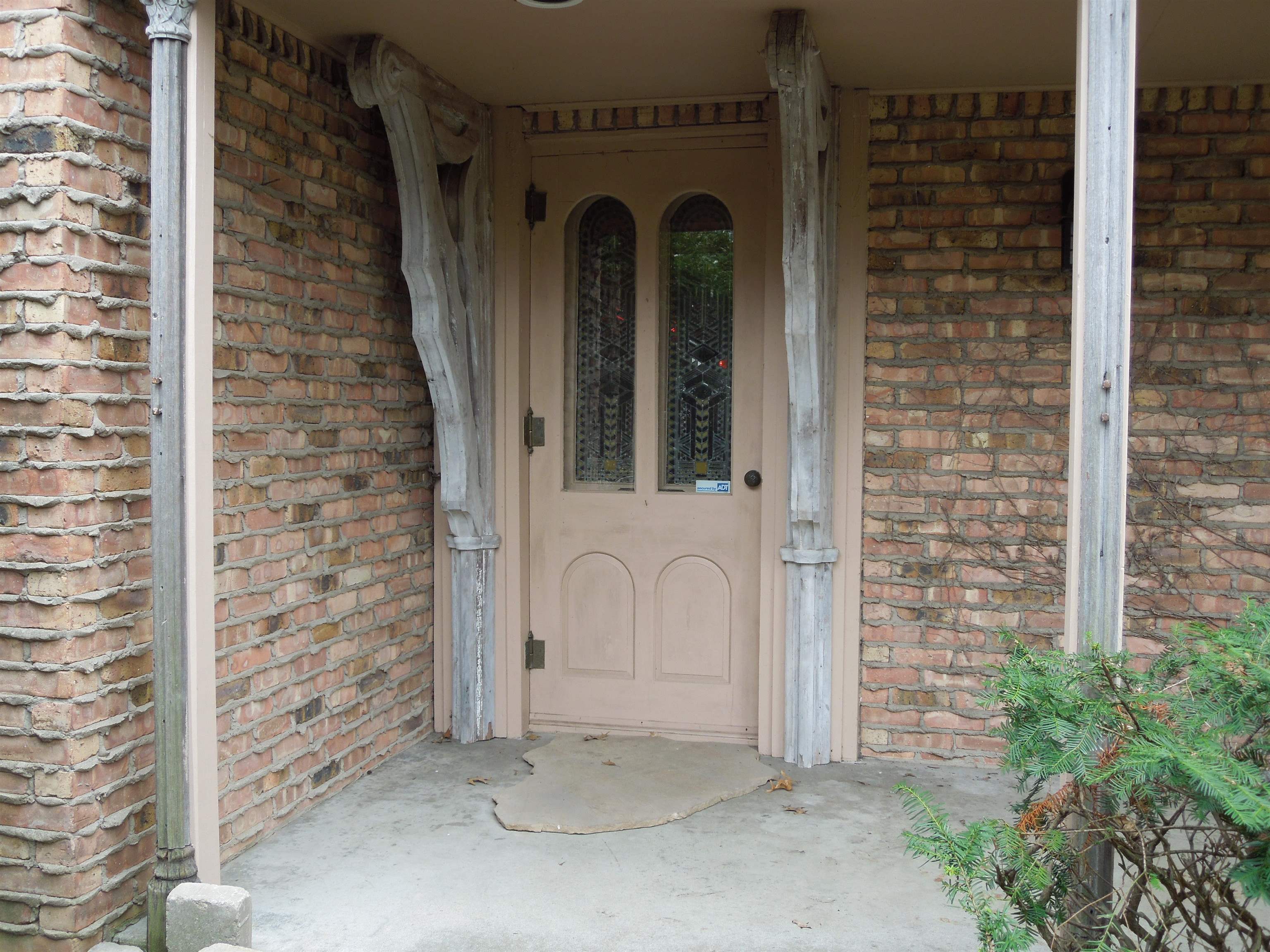 4721 Brookview Road Rockford, IL 61107 - Photo 2 of 26 front view of a door with brick walls