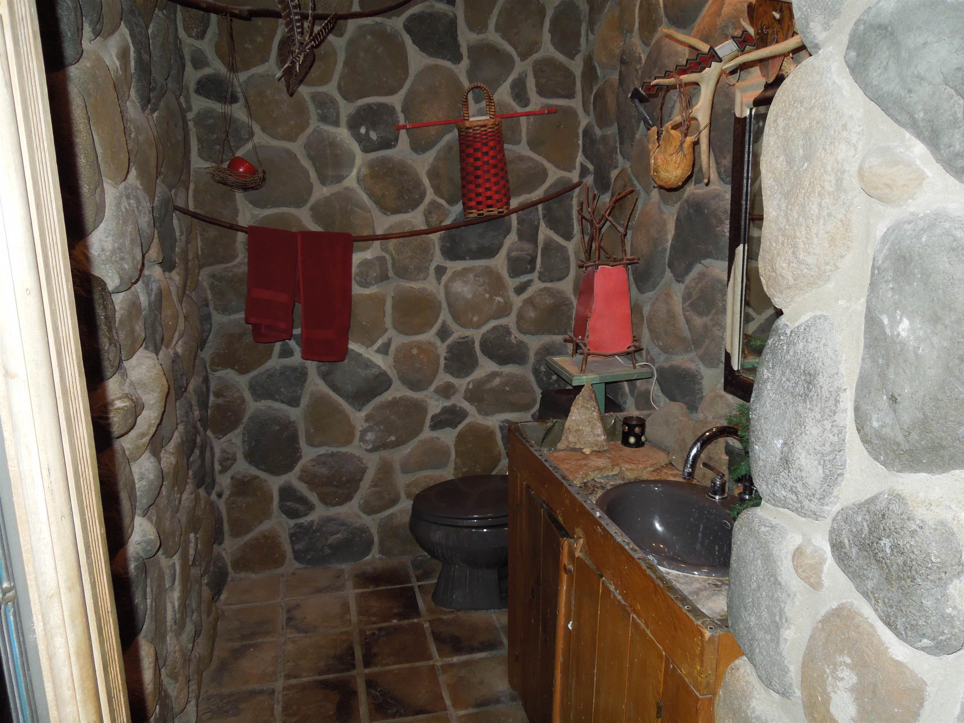 4721 Brookview Road Rockford, IL 61107 - Photo 9 of 26 a bathroom with a sink toilet and shower