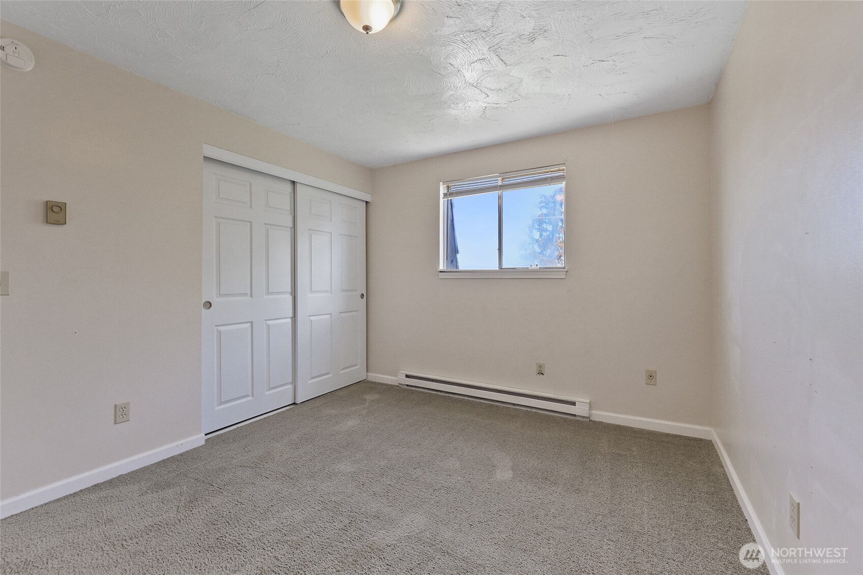 1719 North Willow Road Spokane Valley, WA 99206 - Photo 14 of 27 an empty room with a workbench