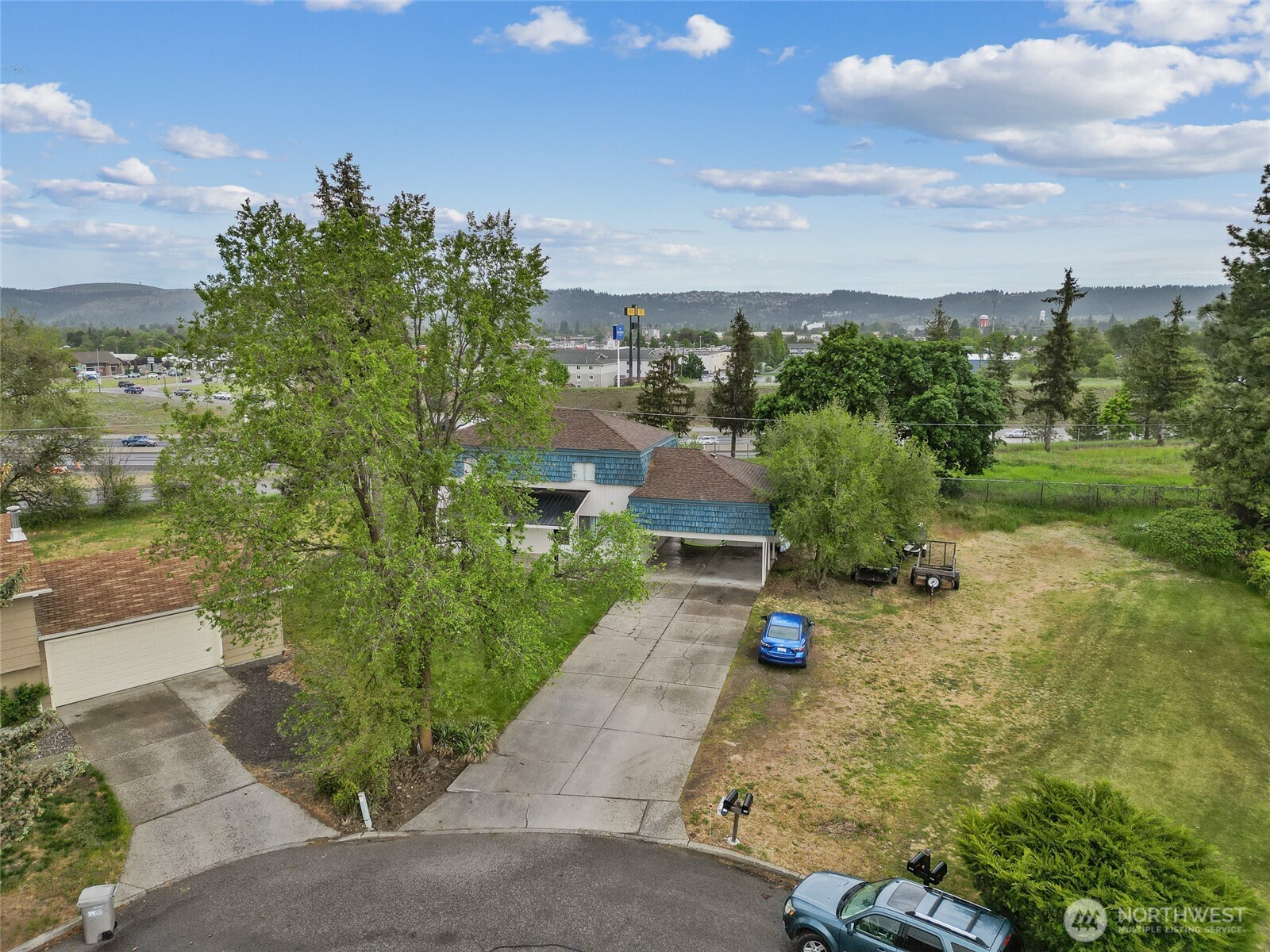 1719 North Willow Road Spokane Valley, WA 99206 - Photo 23 of 27 a park view with tall trees