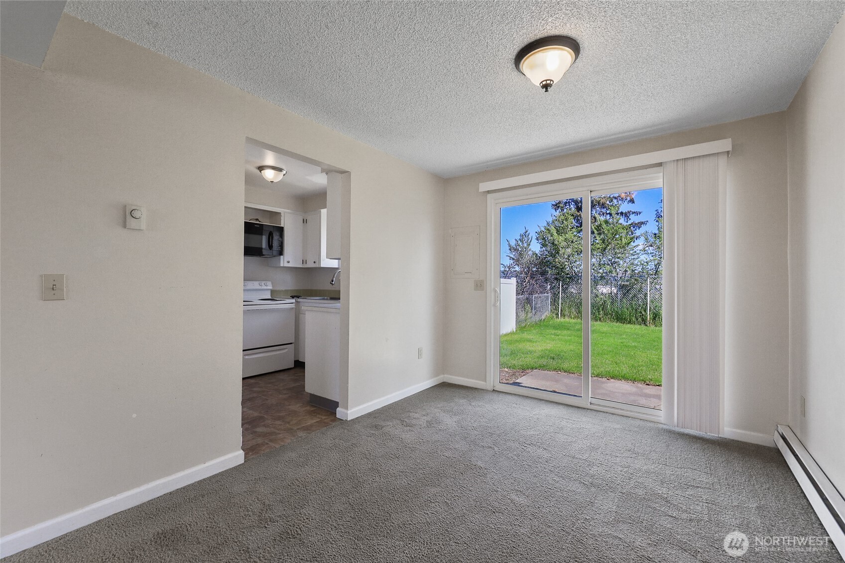 1719 North Willow Road Spokane Valley, WA 99206 - Photo 10 of 27 a view of livingroom with furniture and floor to ceiling window