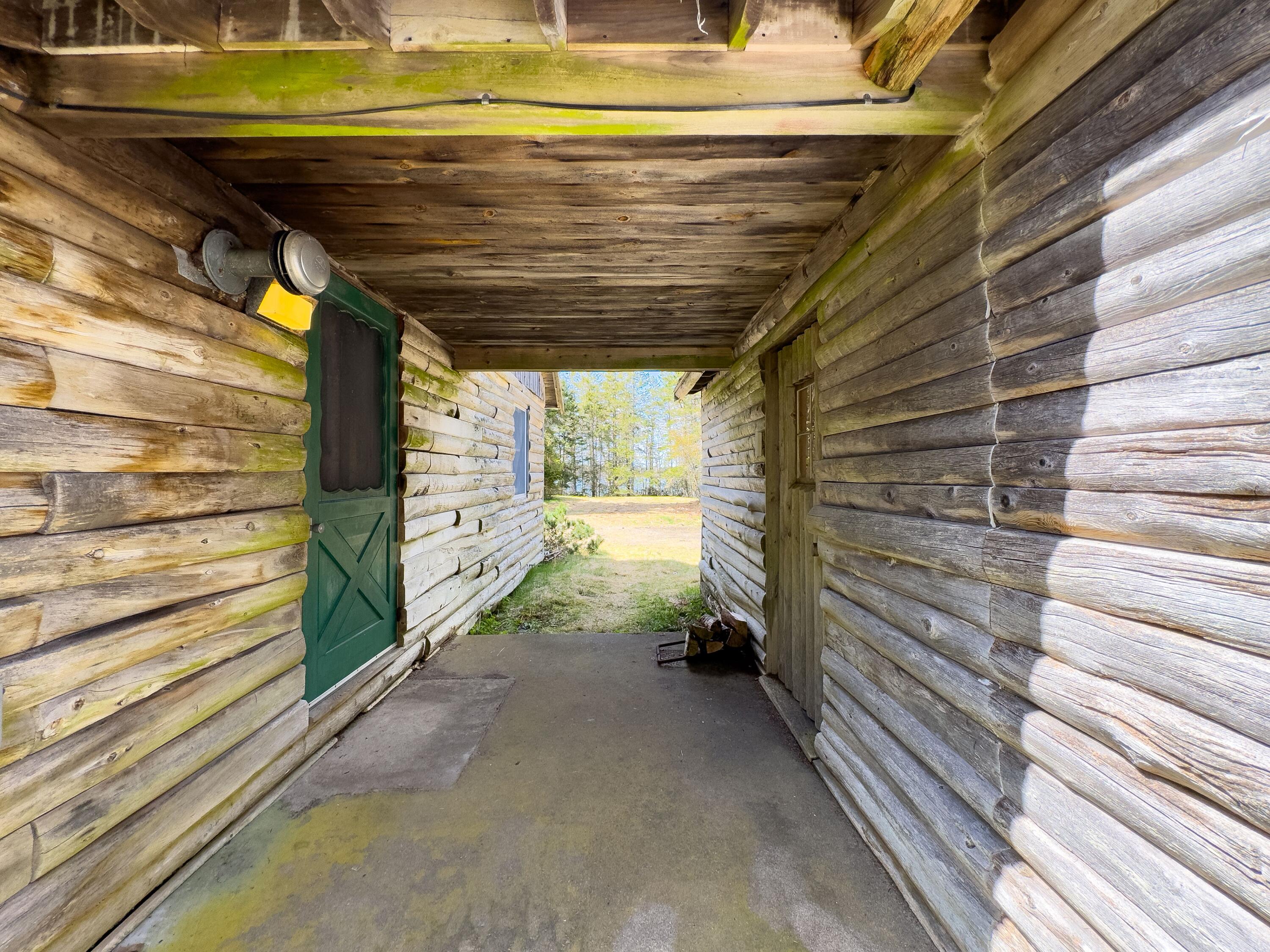 1058 Straight Bay Road Lubec, ME 04652 - Photo 22 of 81 1058 STRAIGHT BAY ROAD COVERED ENTRY