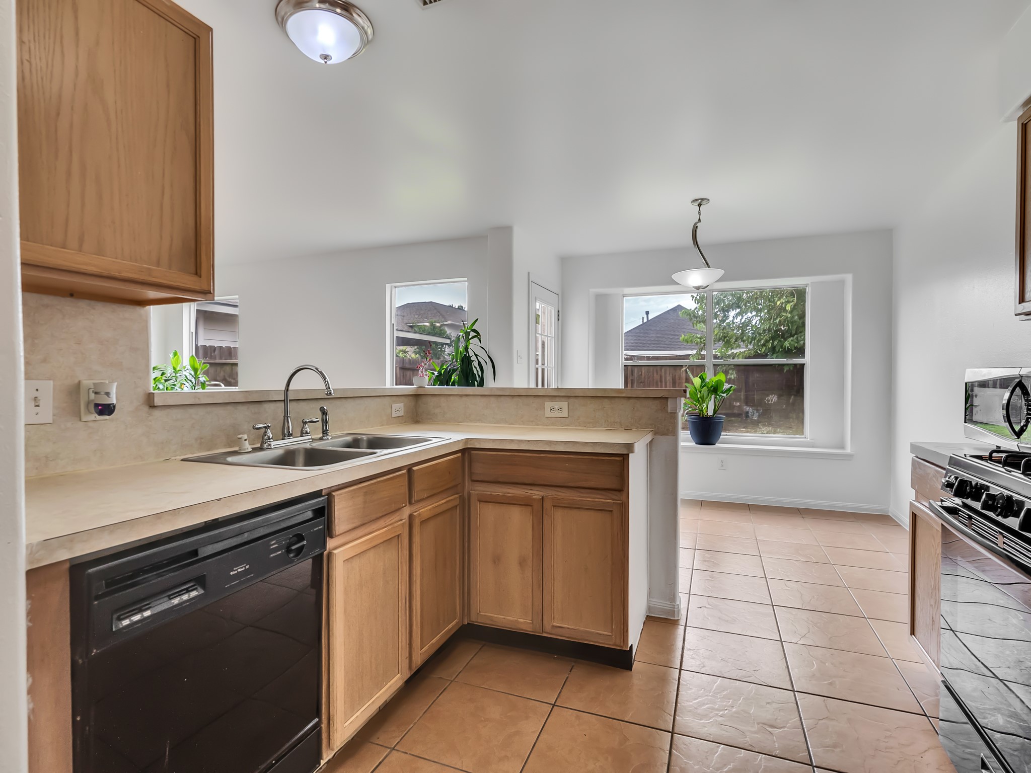 7211 Calcutta Spring Drive Houston, TX 77083 - Photo 4 of 17 New dishwasher & new faucet