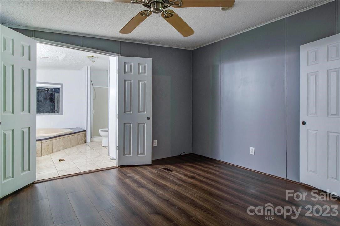 65 Hickory Nut Drive Mill Spring, NC 28756 - Photo 10 of 24 a view of an empty room with a window