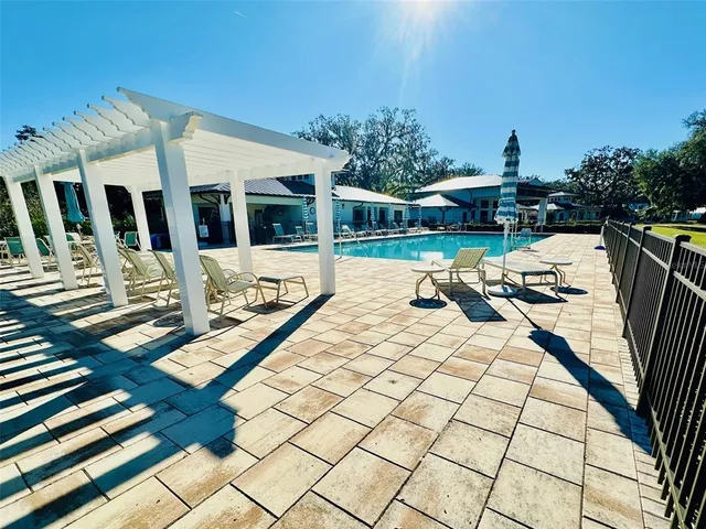 a view of a patio with wooden floor