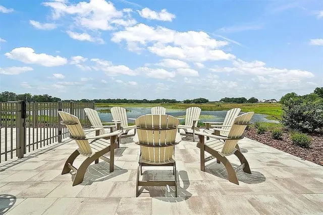 a view of a chair and table on the terrace