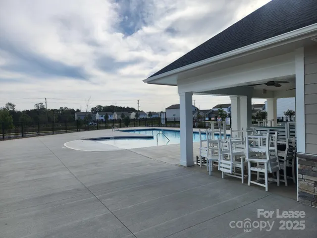 a view of a terrace with chairs