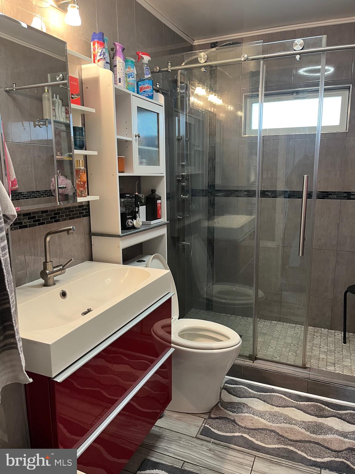 936 Wood Road Feasterville-Trevose, PA 19053 - Photo 11 of 29 a bathroom with a sink toilet and shower
