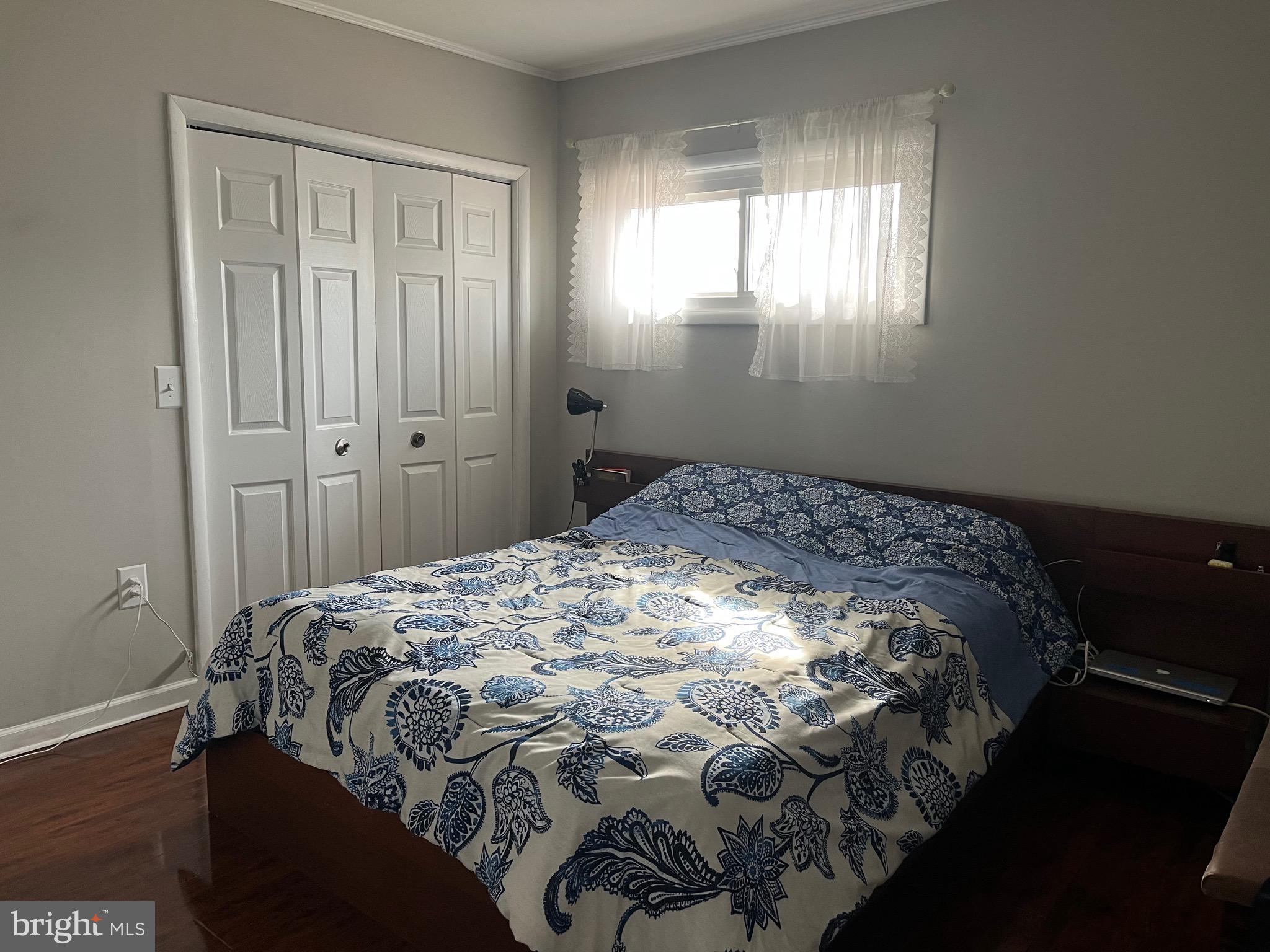 936 Wood Road Feasterville-Trevose, PA 19053 - Photo 13 of 29 a bedroom with a bed and a window