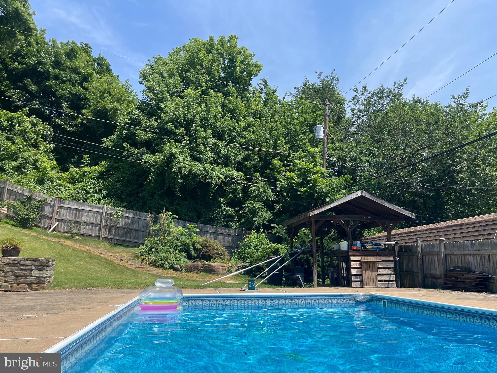 936 Wood Road Feasterville-Trevose, PA 19053 - Photo 19 of 29 a view of backyard with small cabin