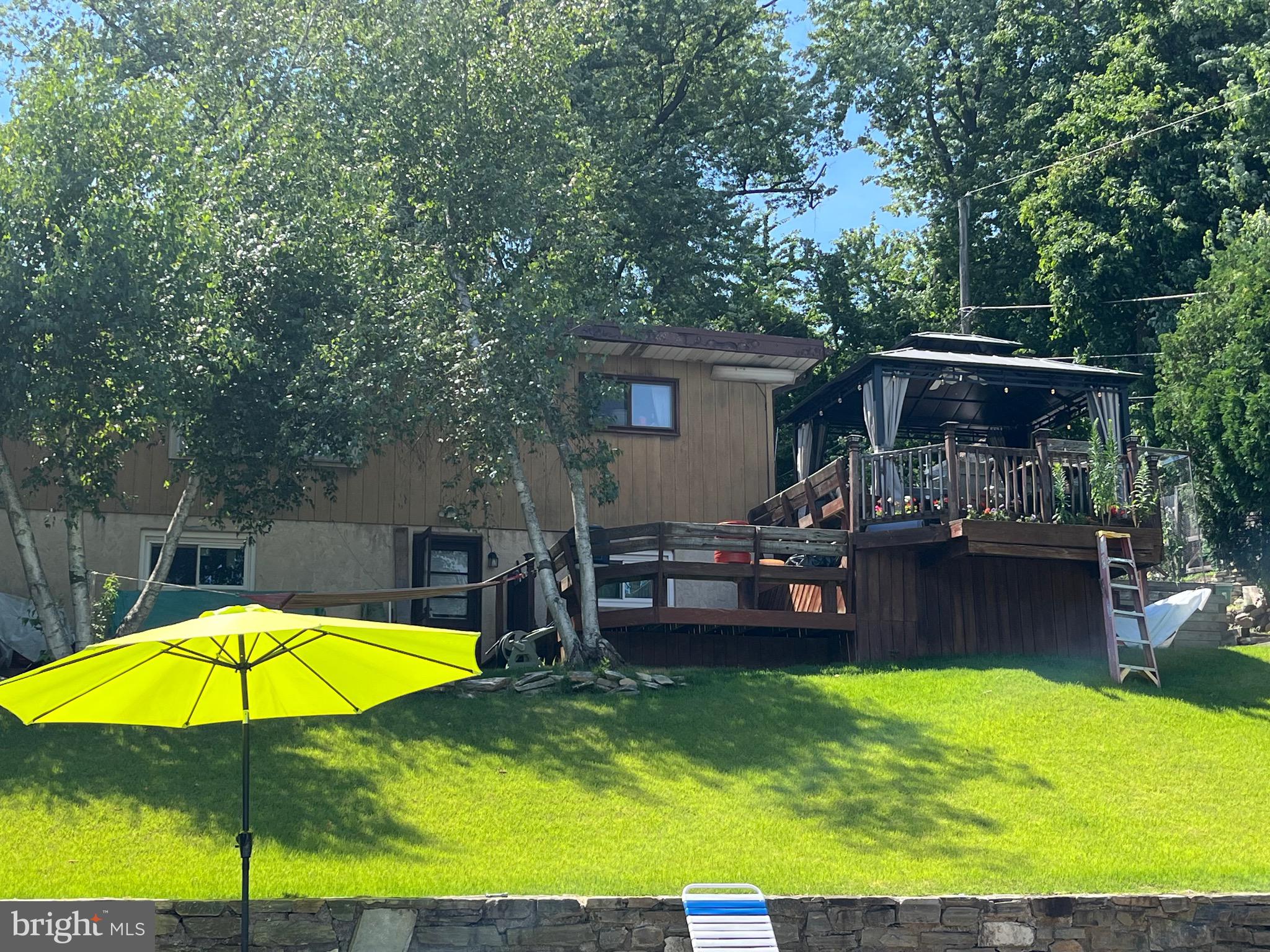 936 Wood Road Feasterville-Trevose, PA 19053 - Photo 21 of 29 a view of a swimming pool with a patio