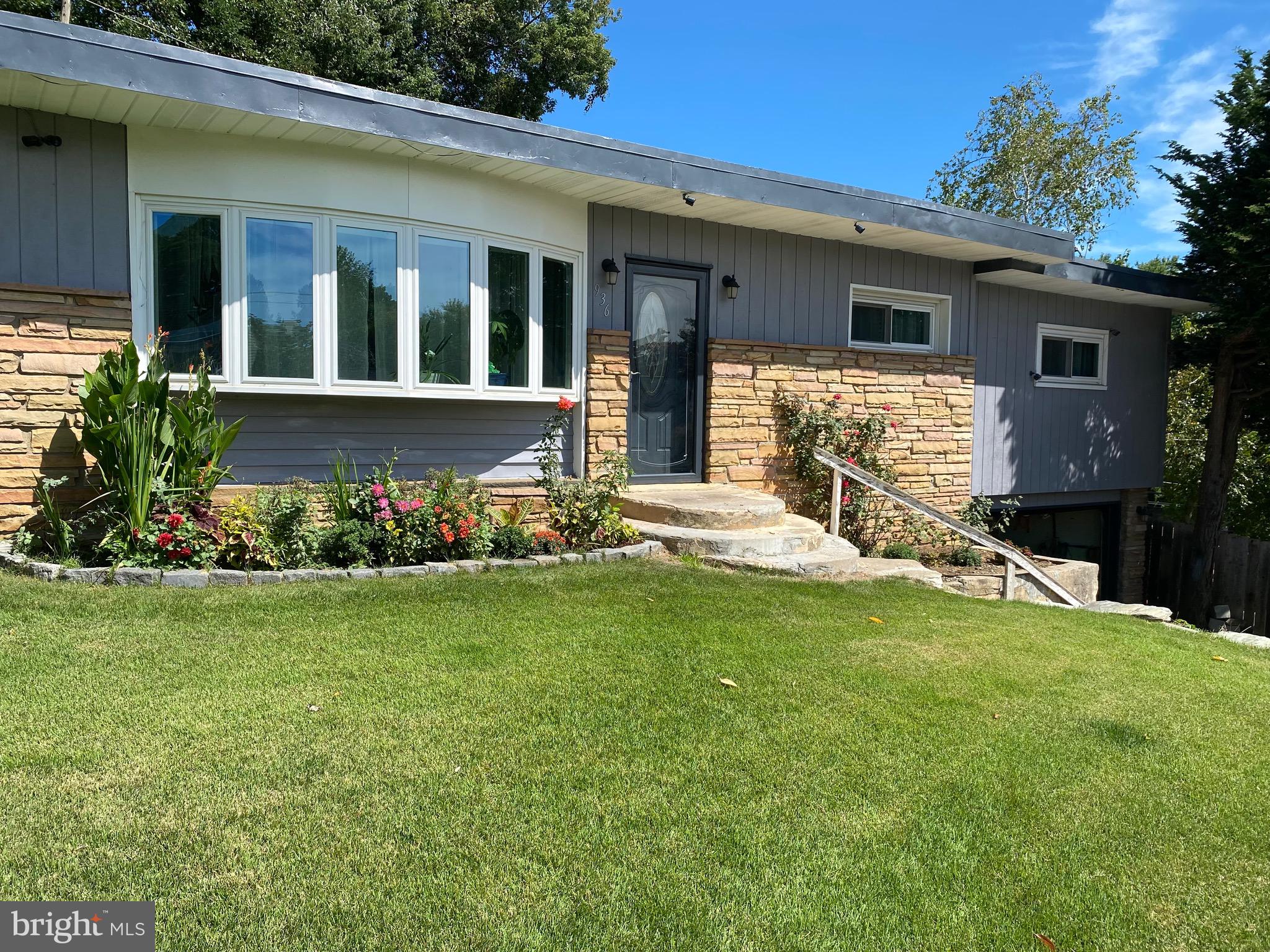 936 Wood Road Feasterville-Trevose, PA 19053 - Photo 24 of 29 front view of a house with a yard