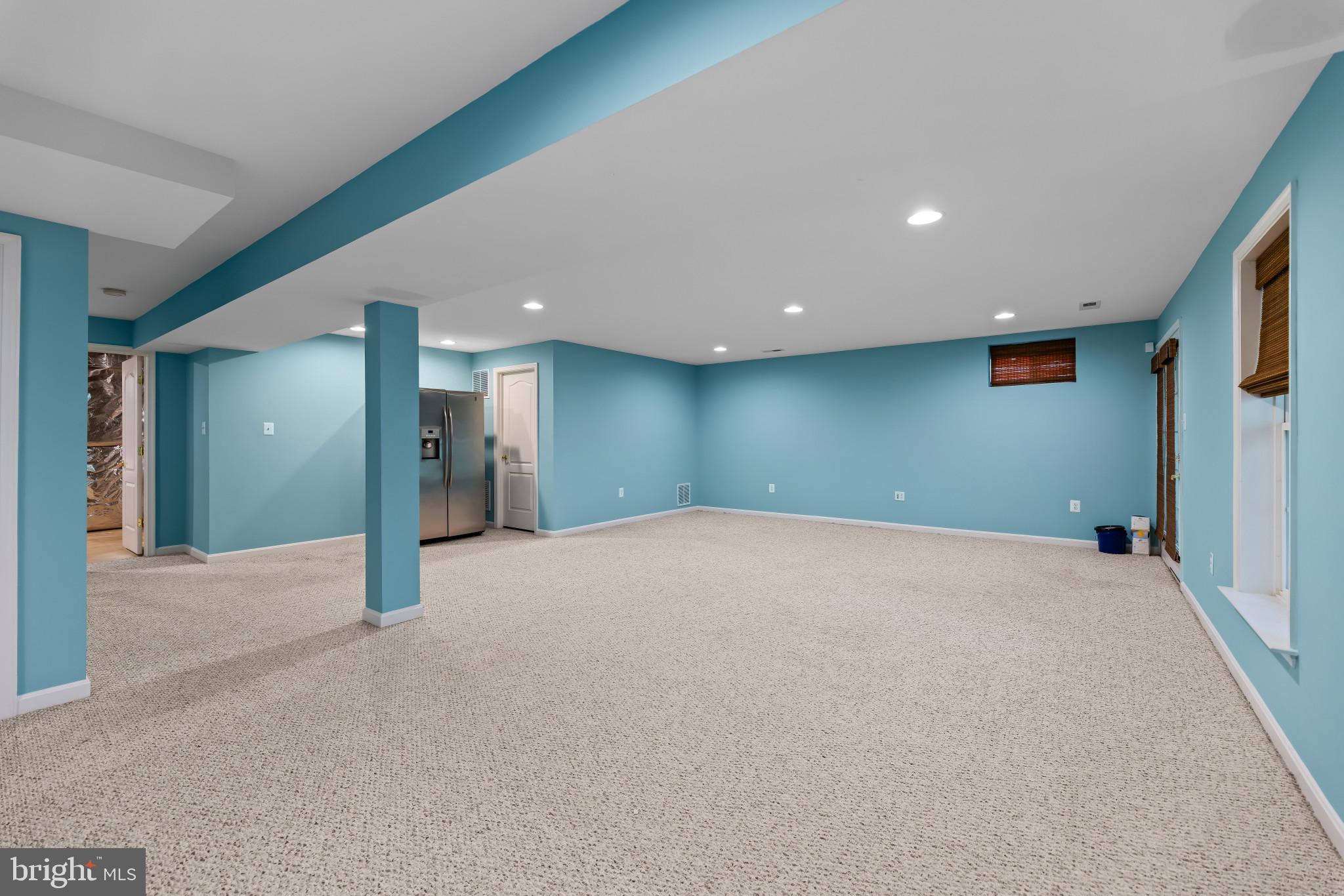 42920 Cattail Meadows Place Broadlands, VA 20148 - Photo 40 of 55 Finished basement with stainless steel refrigerato