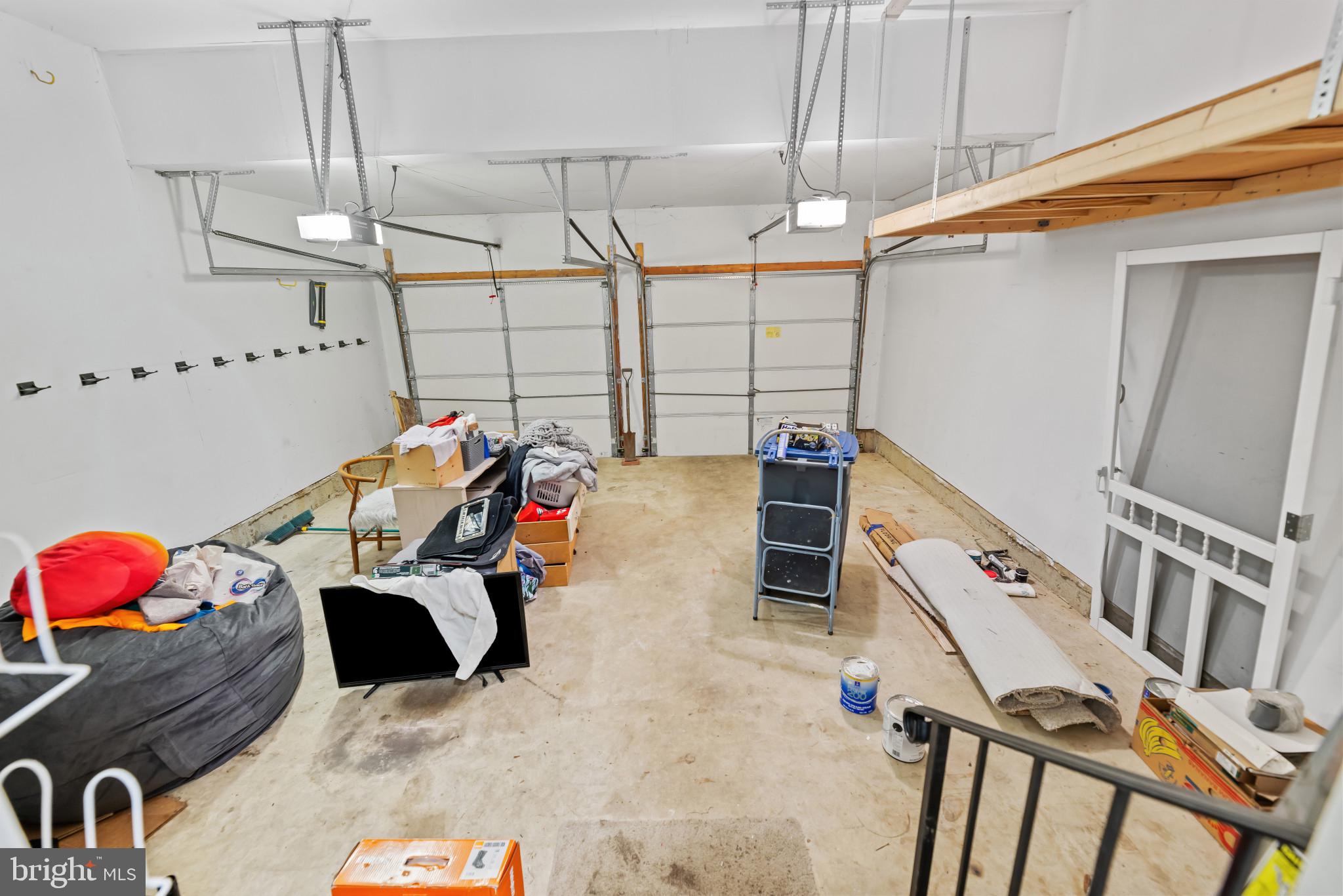 42920 Cattail Meadows Place Broadlands, VA 20148 - Photo 48 of 55 Garage featuring a garage door opener