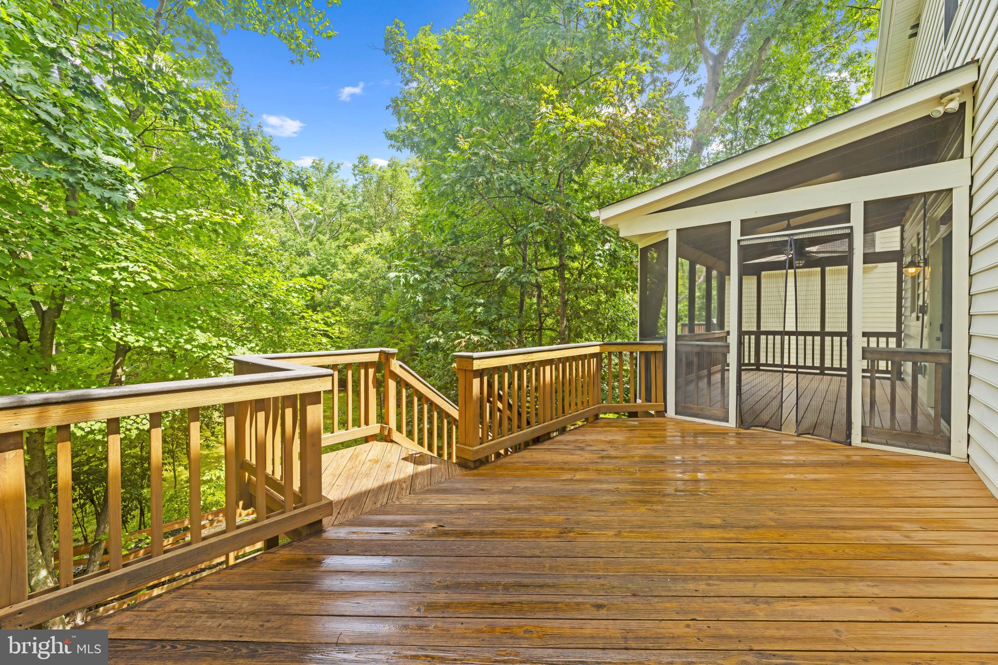 42920 Cattail Meadows Place Broadlands, VA 20148 - Photo 49 of 55 a view of balcony with wooden floor and fence