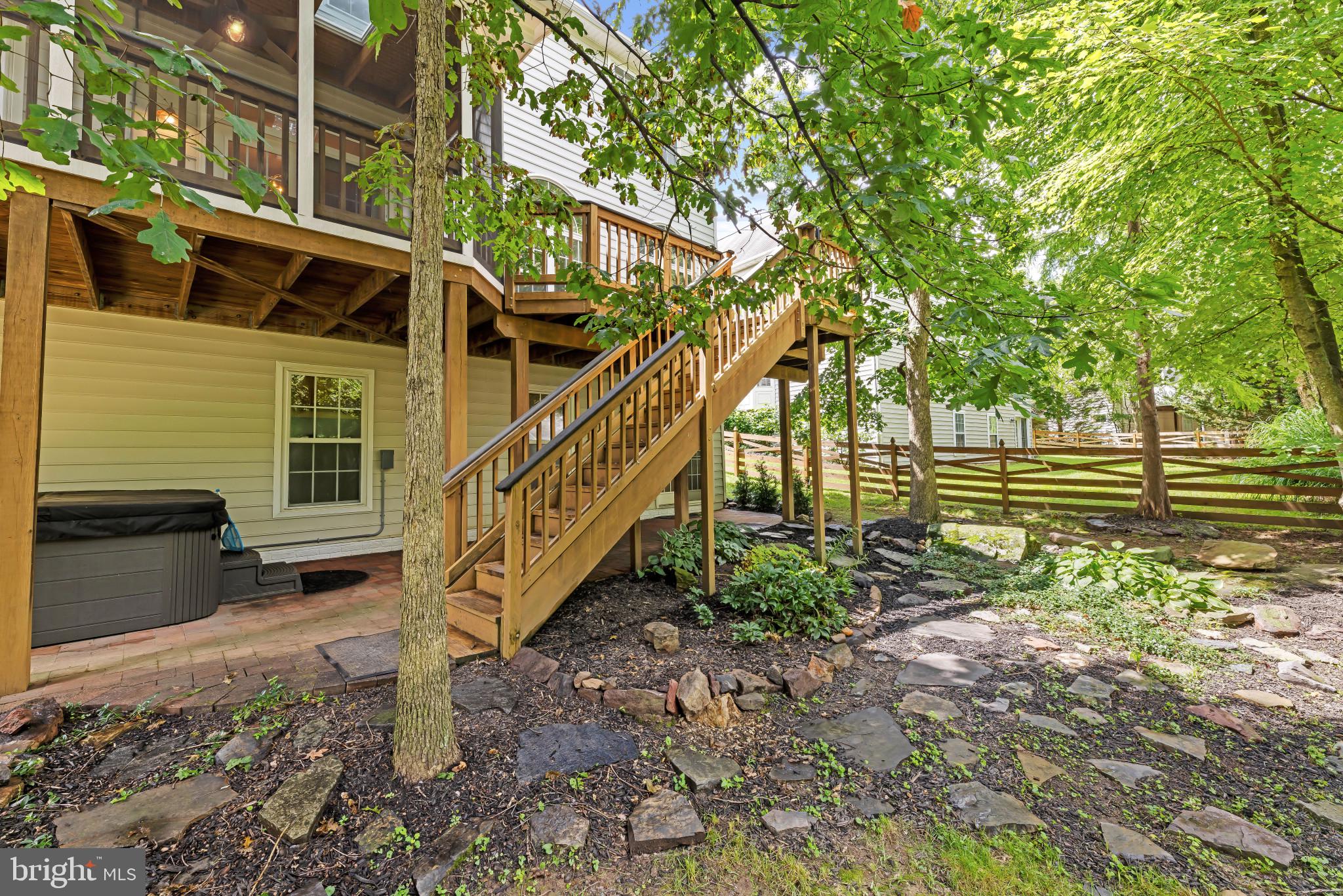 42920 Cattail Meadows Place Broadlands, VA 20148 - Photo 51 of 55 a view of a house with a yard