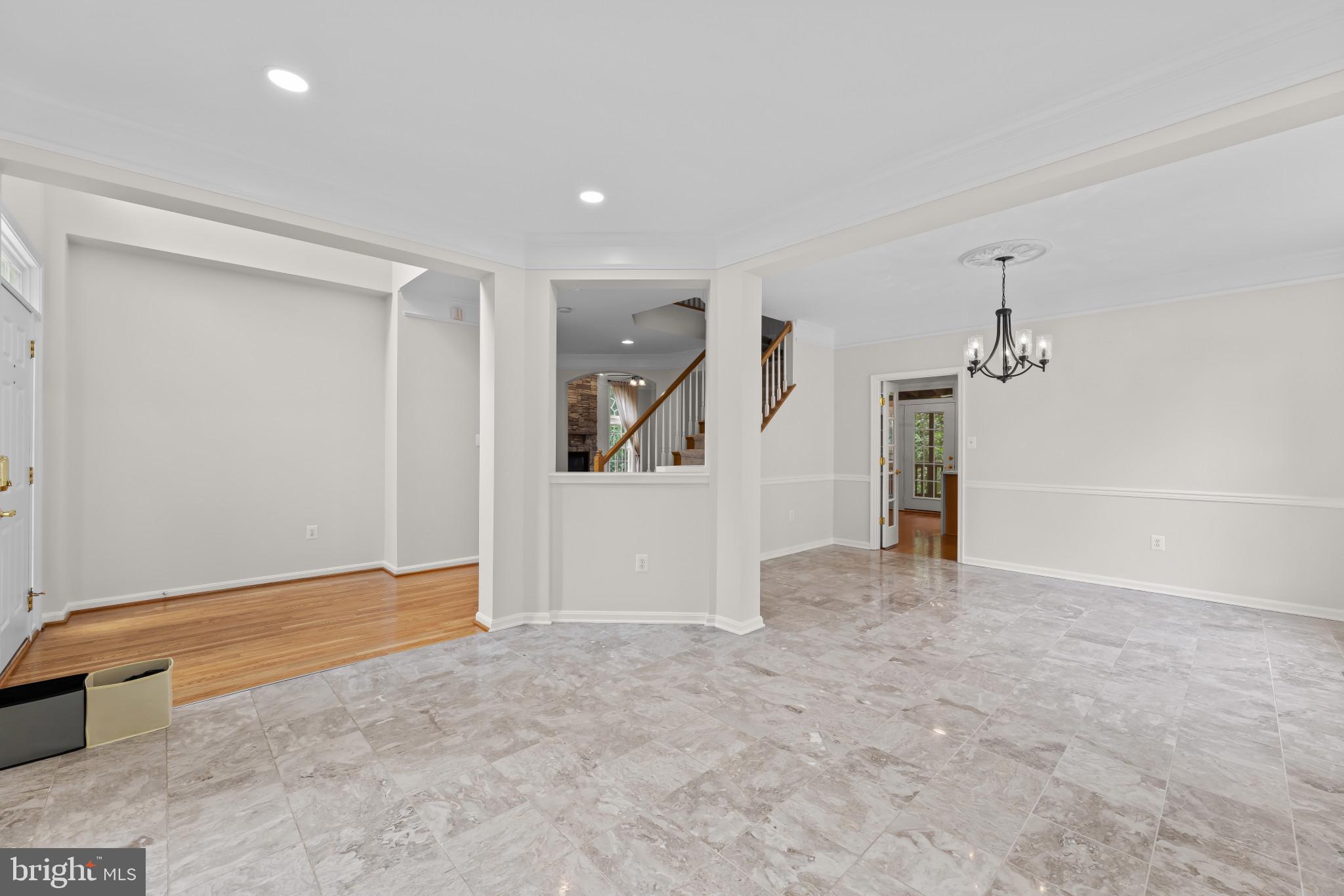 42920 Cattail Meadows Place Broadlands, VA 20148 - Photo 7 of 55 an empty room with ceiling fan and windows