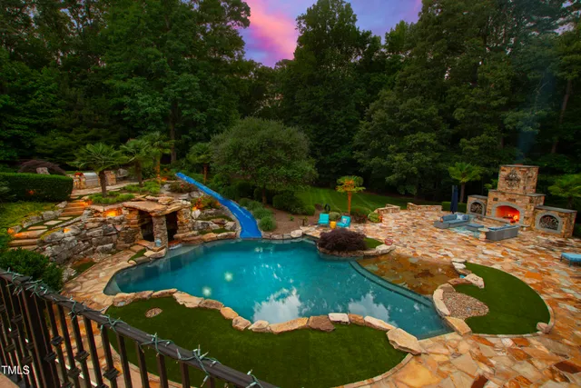 a view of a tree with a yard