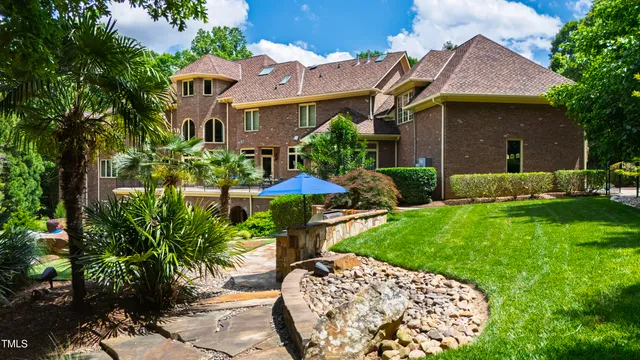 a kitchen with stainless steel appliances granite countertop a stove and a sink