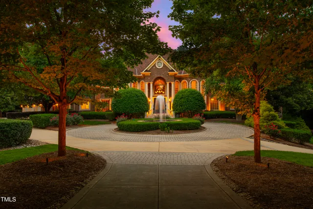 a sign board with yard in the back