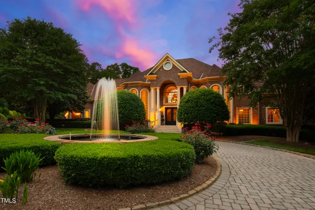 a view of a house with a swimming pool