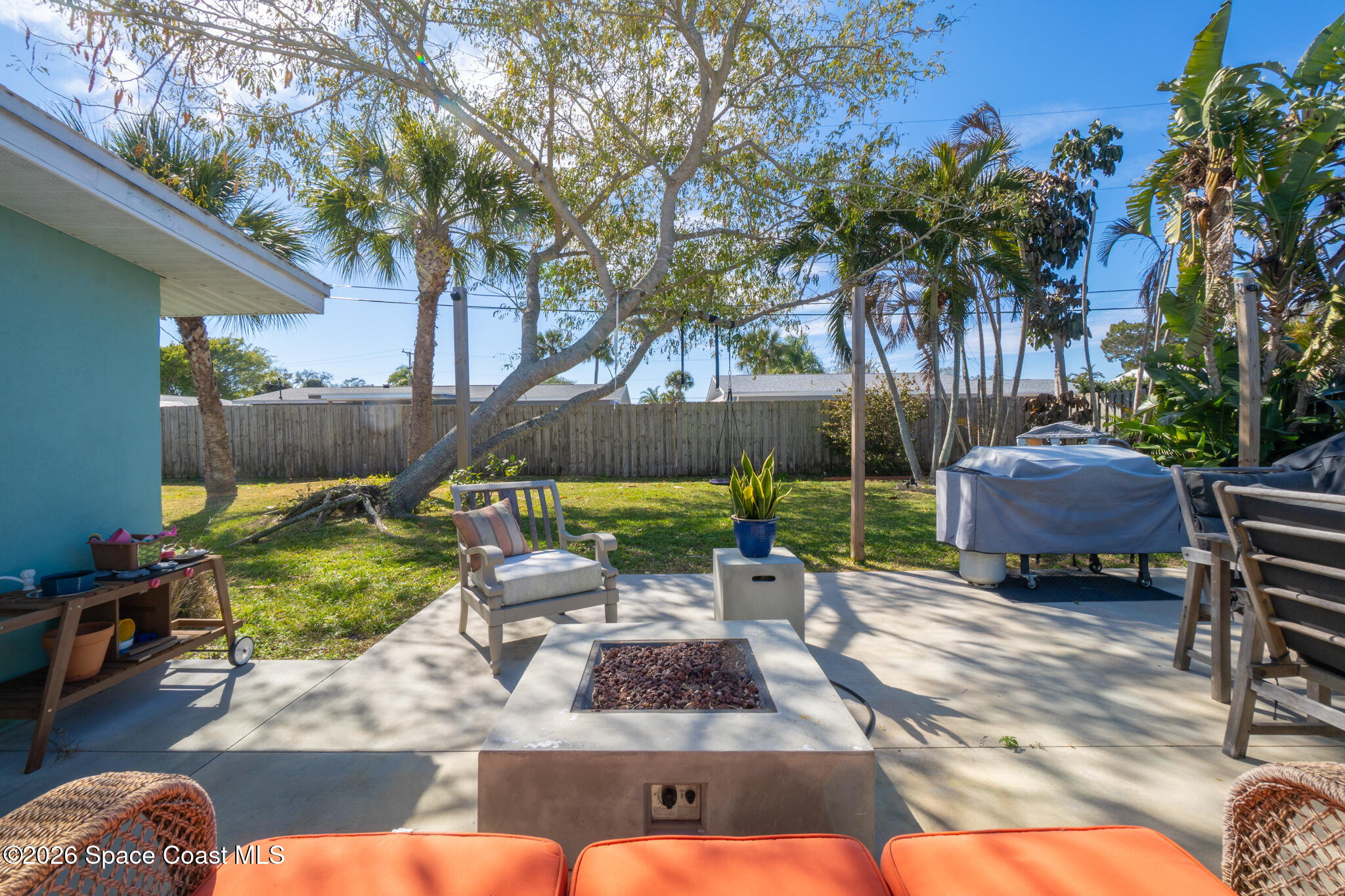 740 Java Road Cocoa Beach, FL 32931 - Photo 15 of 40 a view of a backyard with a patio