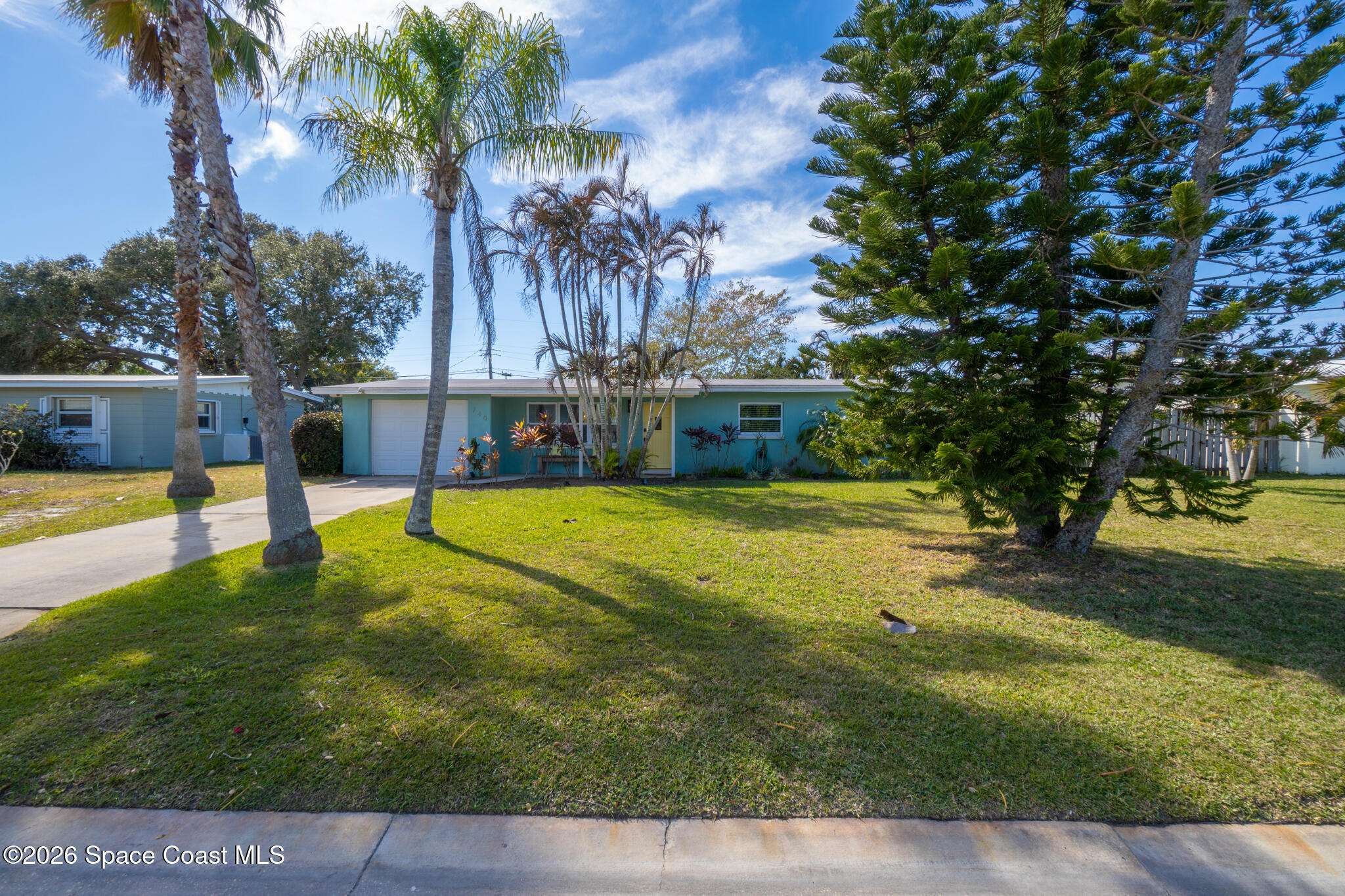 740 Java Road Cocoa Beach, FL 32931 - Photo 20 of 42 Spacious Front Yard
