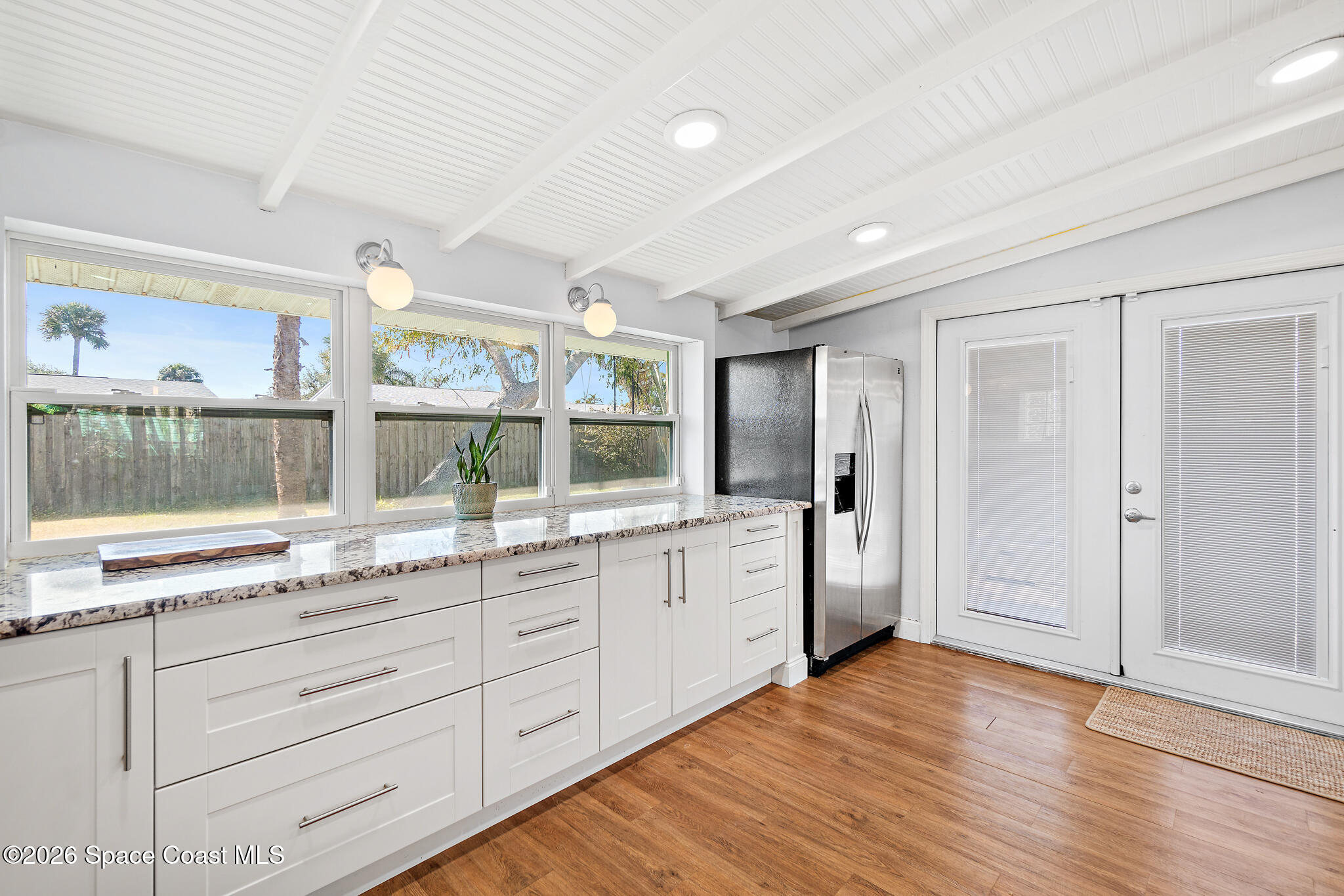 740 Java Road Cocoa Beach, FL 32931 - Photo 23 of 42 Kitchen with Backyard Views