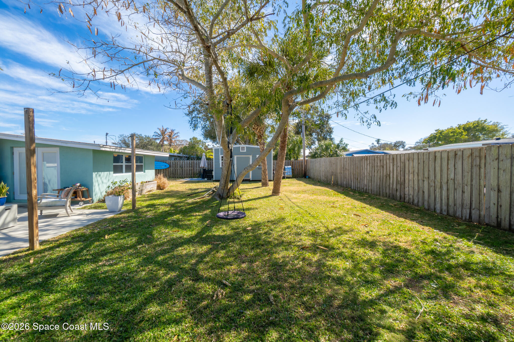 740 Java Road Cocoa Beach, FL 32931 - Photo 29 of 40 a view of a backyard