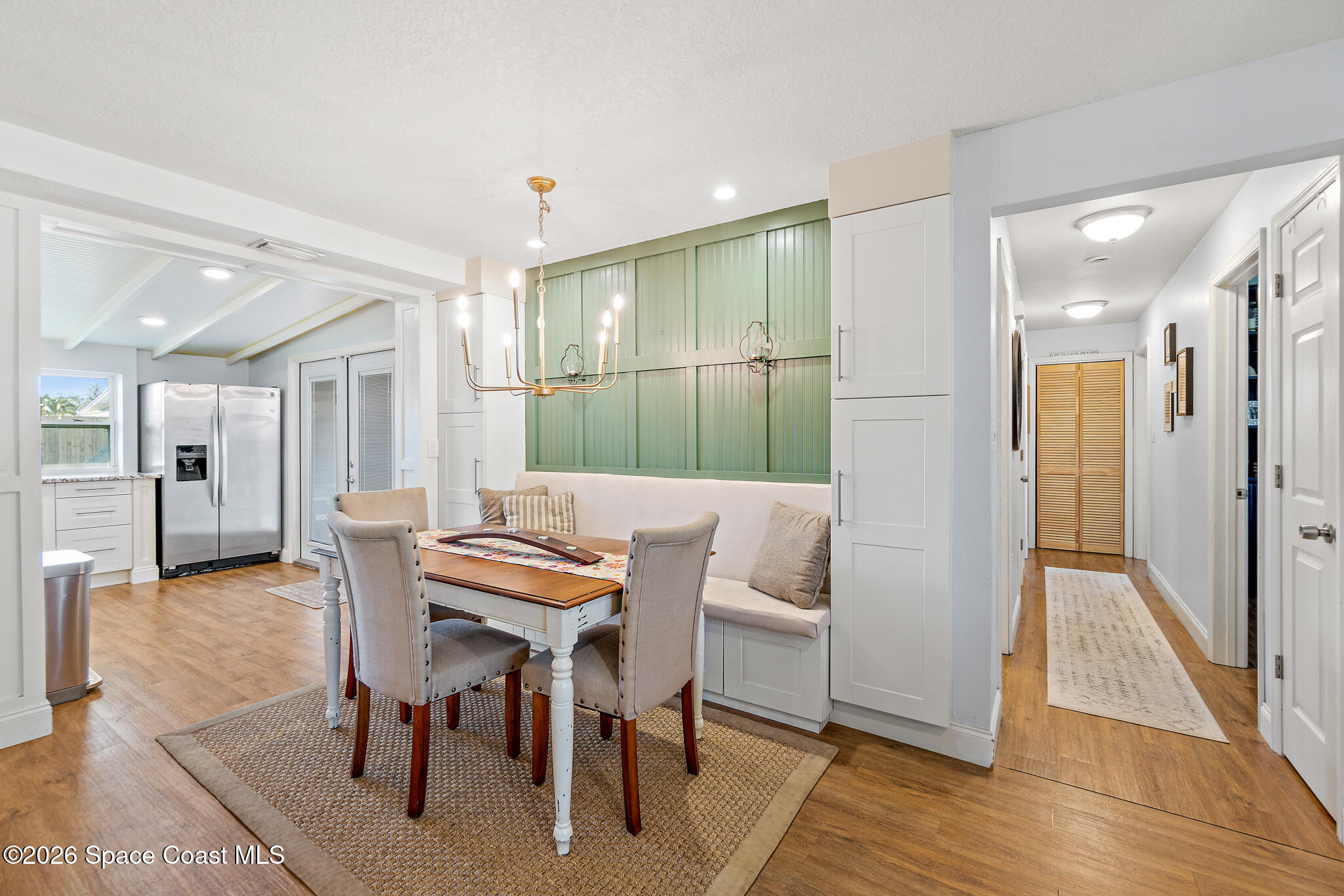 740 Java Road Cocoa Beach, FL 32931 - Photo 6 of 40 a view of a a dining room with furniture window and wooden floor