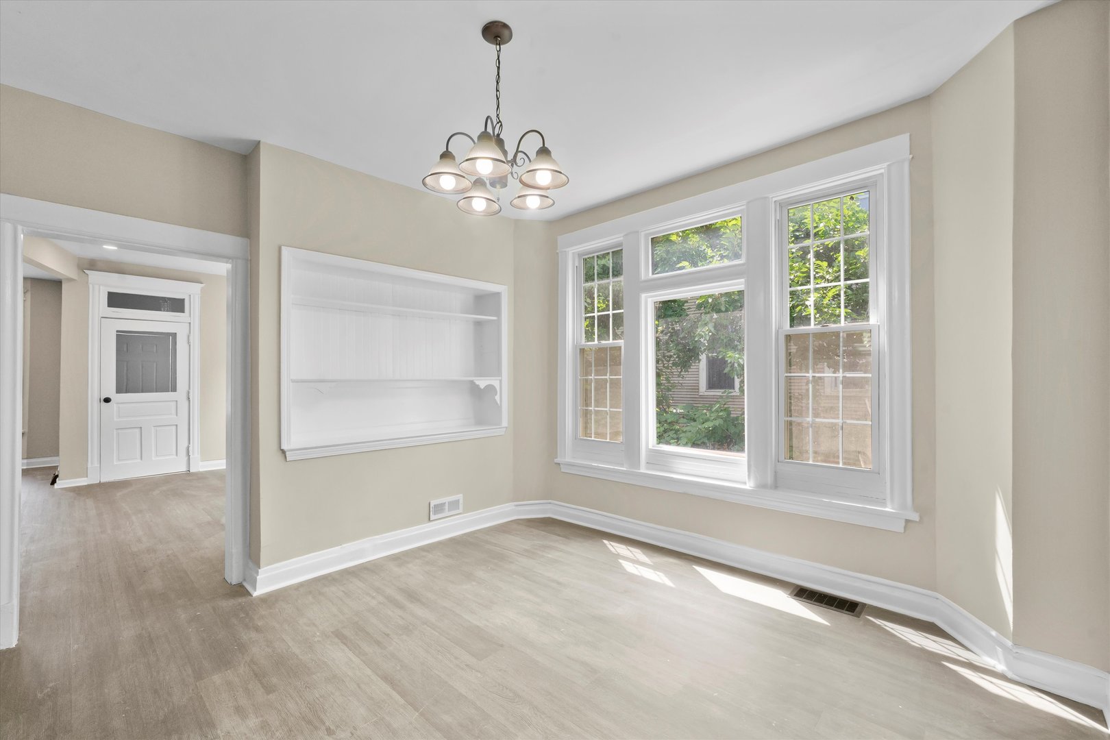 7224 South Union Avenue Chicago, IL 60621 - Photo 12 of 43 a view of an empty room with a window