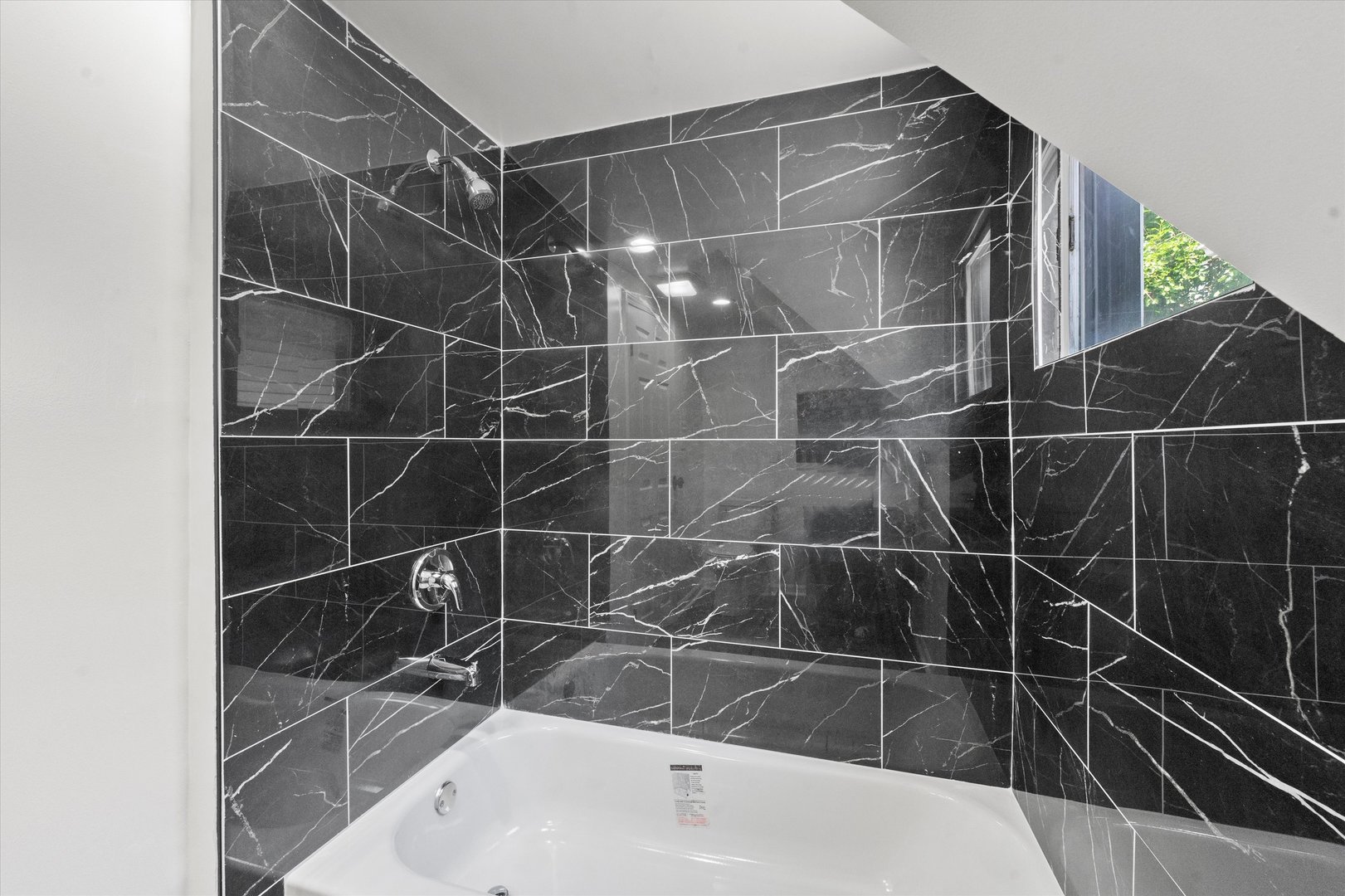 7224 South Union Avenue Chicago, IL 60621 - Photo 19 of 43 a bathroom with a shower and a sink