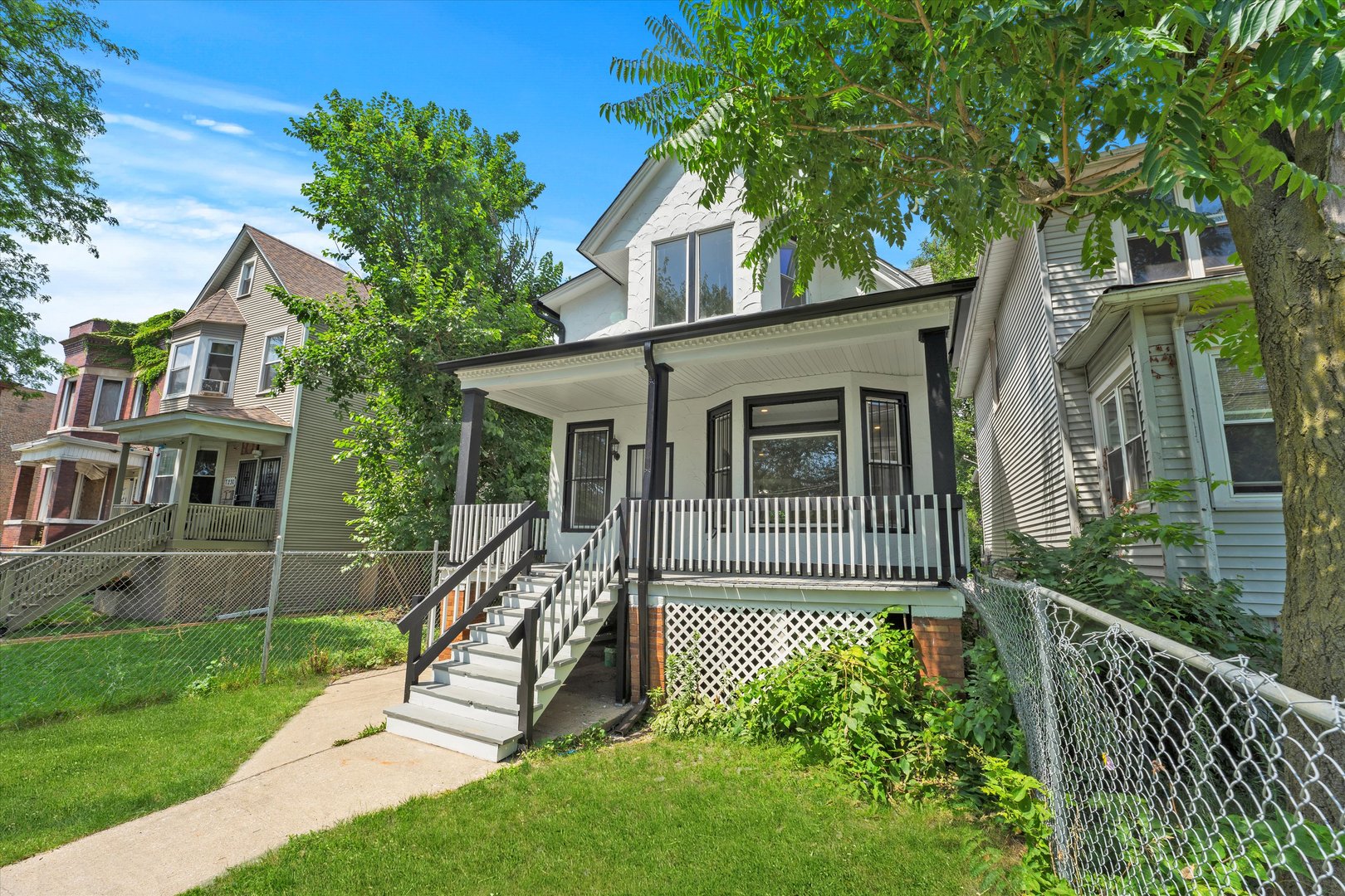 7224 South Union Avenue Chicago, IL 60621 - Photo 3 of 43 front view of a house with a yard