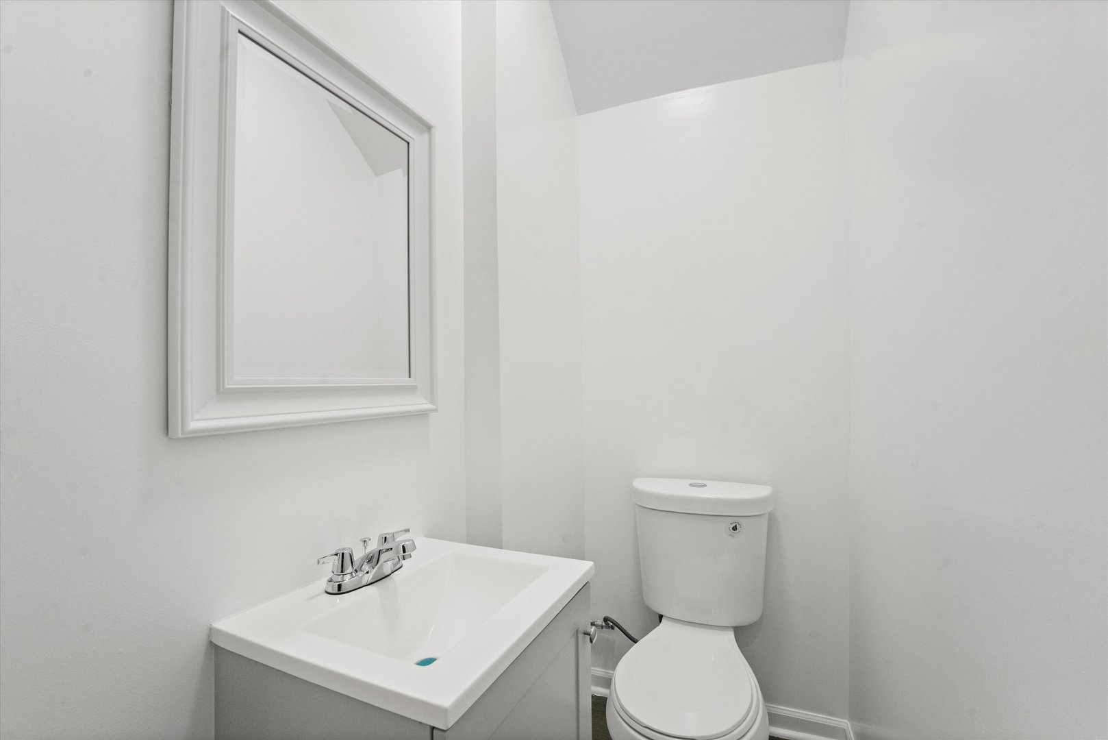 7224 South Union Avenue Chicago, IL 60621 - Photo 38 of 43 a white toilet sitting next to a white sink