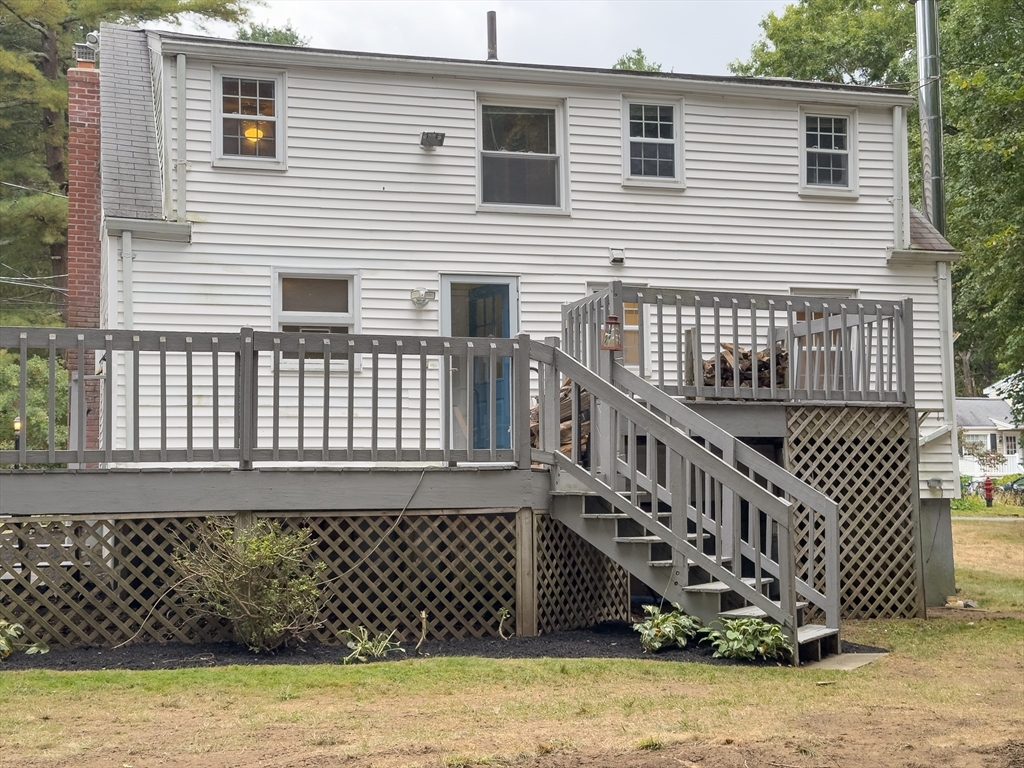 25 Adams Road Ashland, MA 01721 - Photo 31 of 34 a view of a house with wooden fence