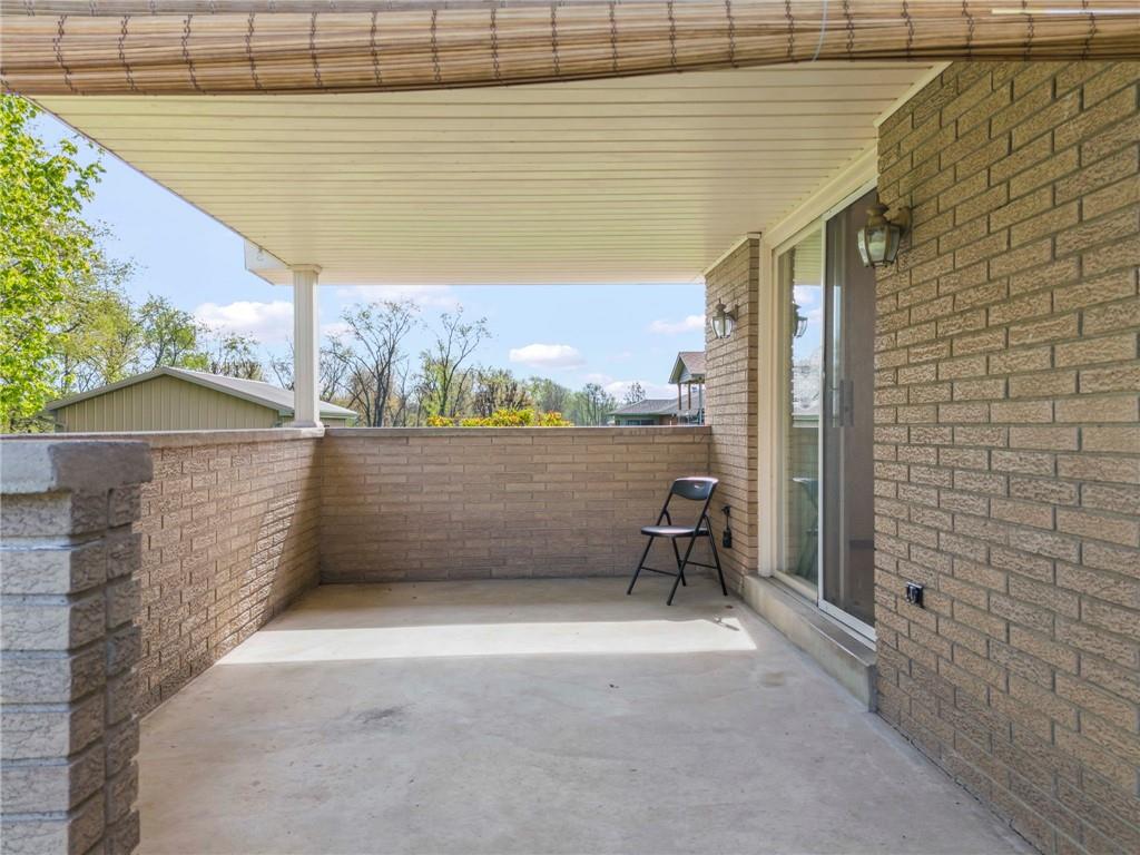 254 Walnut Street Houston, PA 15342 - Photo 26 of 29 a view of a terrace with a bench