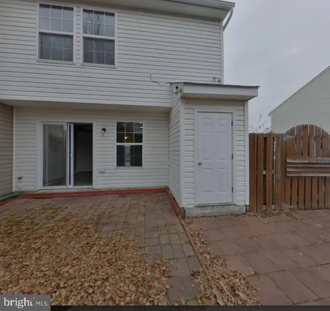 a view of backyard of house