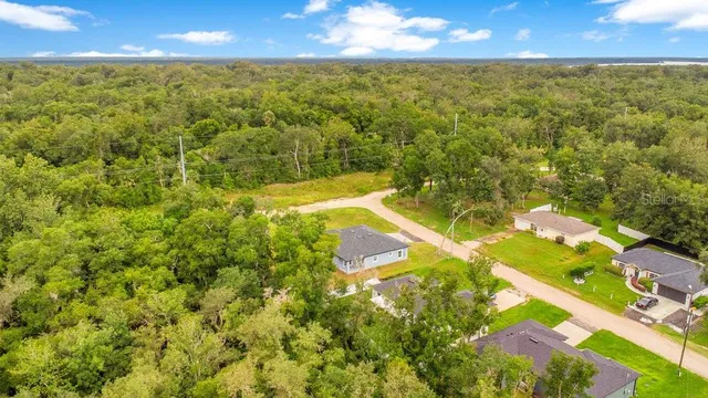 a view of a yard with an outdoor space
