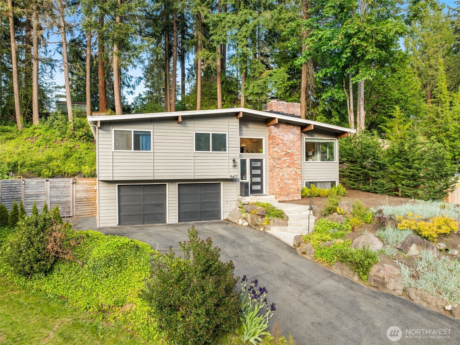 9417 235th Place Southwest Edmonds, WA 98020 - Photo 27 of 30 front view of a house with a yard