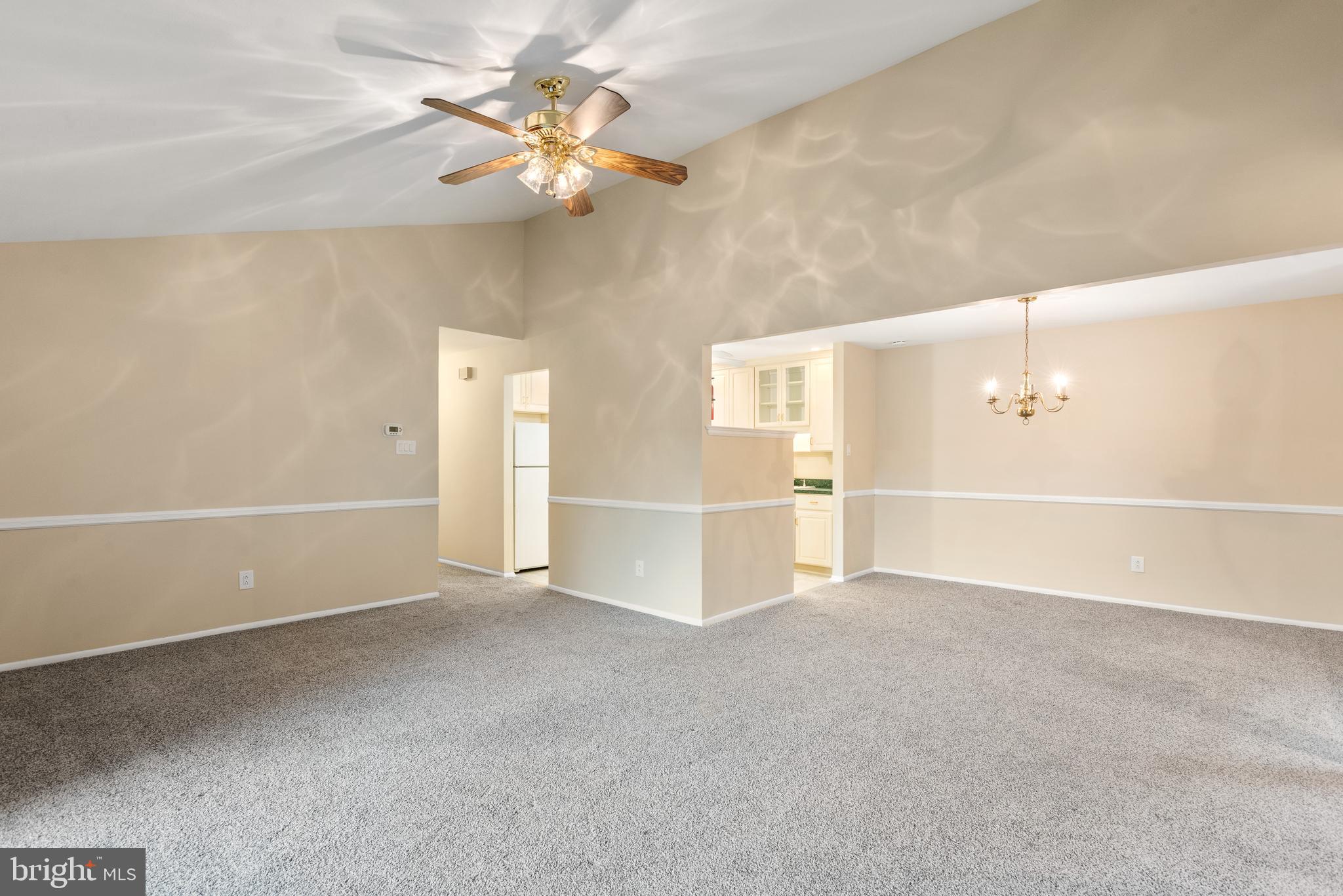 1606 Raintree Lane, Unit 1606 Malvern, PA 19355 - Photo 10 of 34 Living Room Open to Dining Room