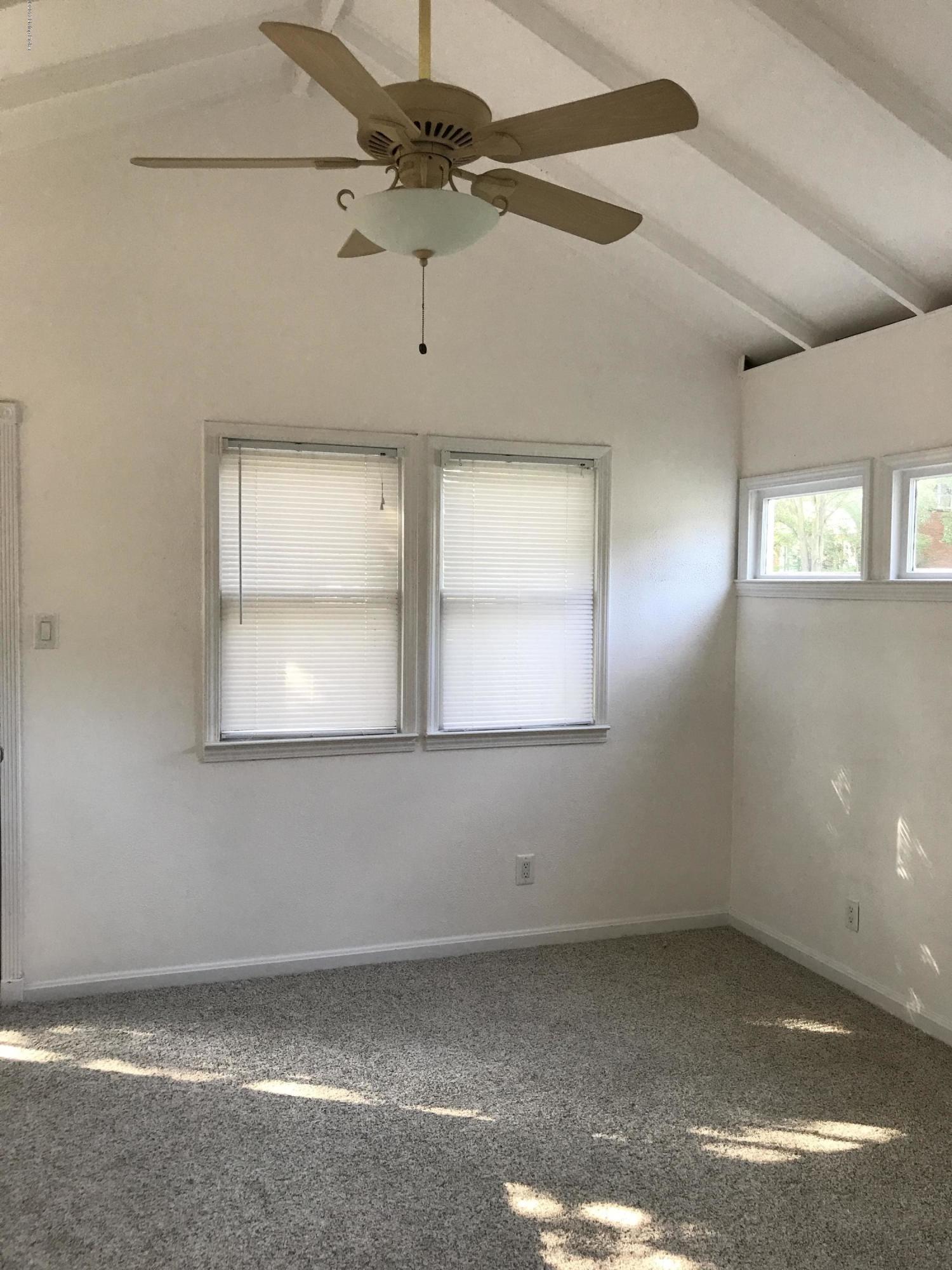 2709 Alanmede Road Louisville, KY 40205 - Photo 7 of 13 Vaulted family room at back of house. Perfect spot to lounge and watch TV or read a book.