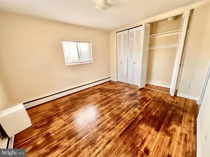 a bathroom with a toilet a sink and a bathtub