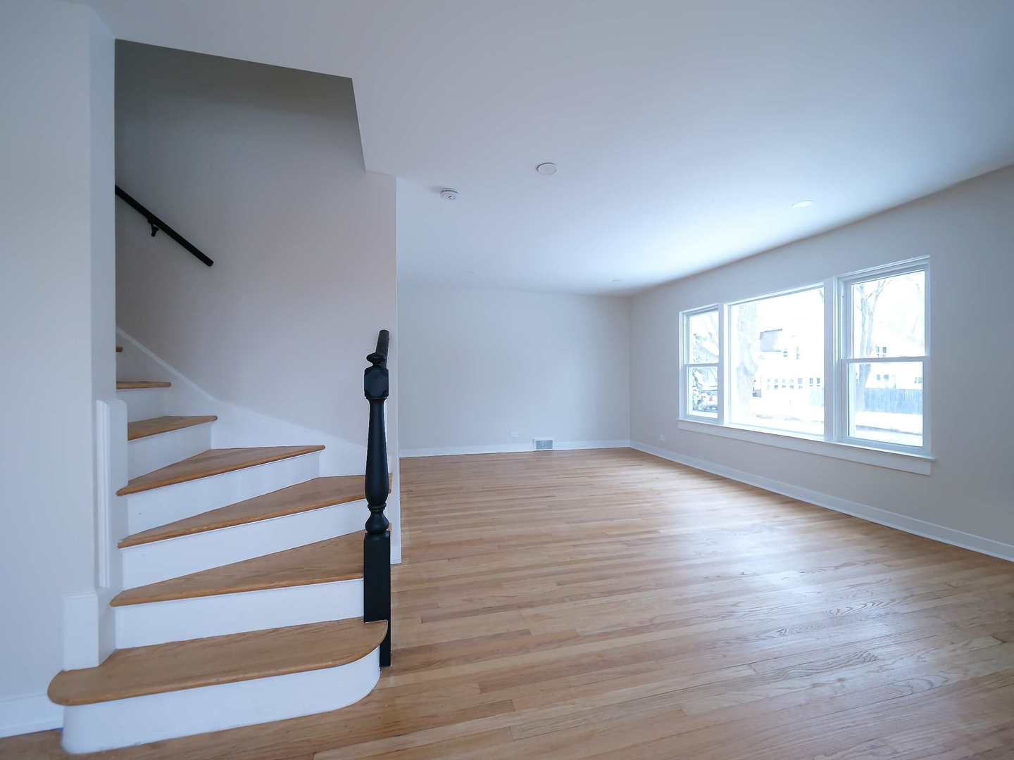 2926 Prairie Avenue Brookfield, IL 60513 - Photo 5 of 49 a view of empty room with wooden floor and fan