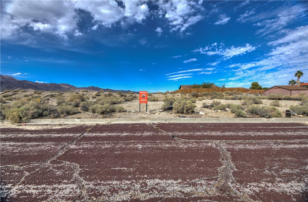 0 Locust Street Trona, CA 93562 - Photo 2 of 10 a view of a yard with a house